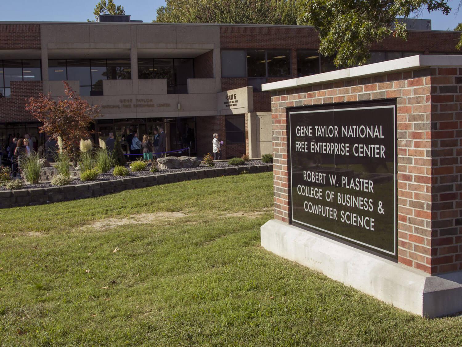 large brick sign outside Taylor Center