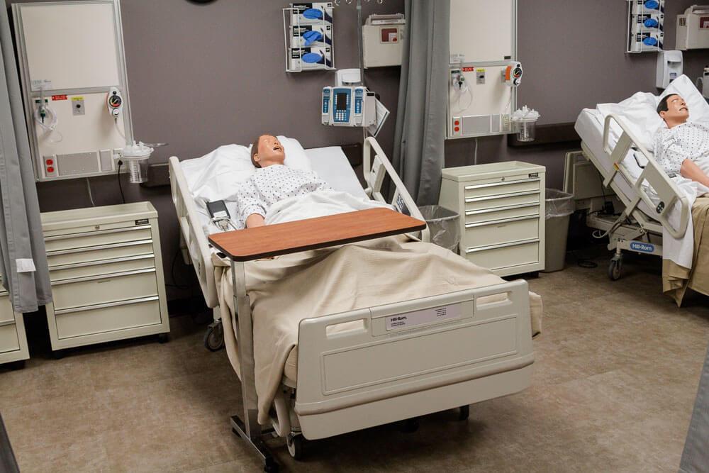 Simulated hospital room in nursing lab