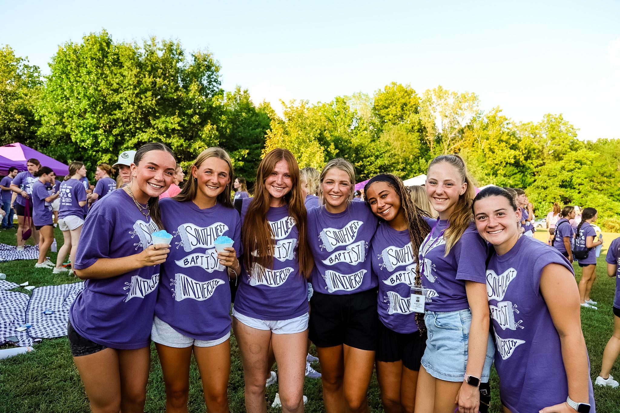 Students eating snow cones and smiling during Welcome Week 2025.