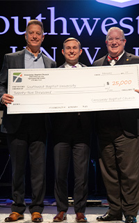 Crossway Baptist Chruch presents check to President Melson