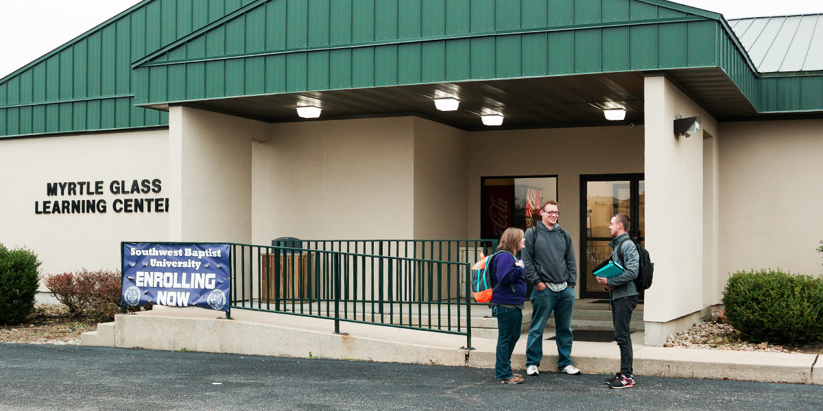 students outside main building of S-B-U Mountain View campus