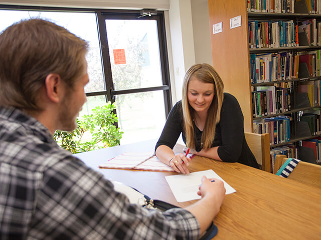 SBU students studying in library