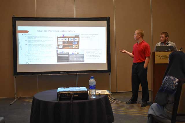 Students presenting at conference