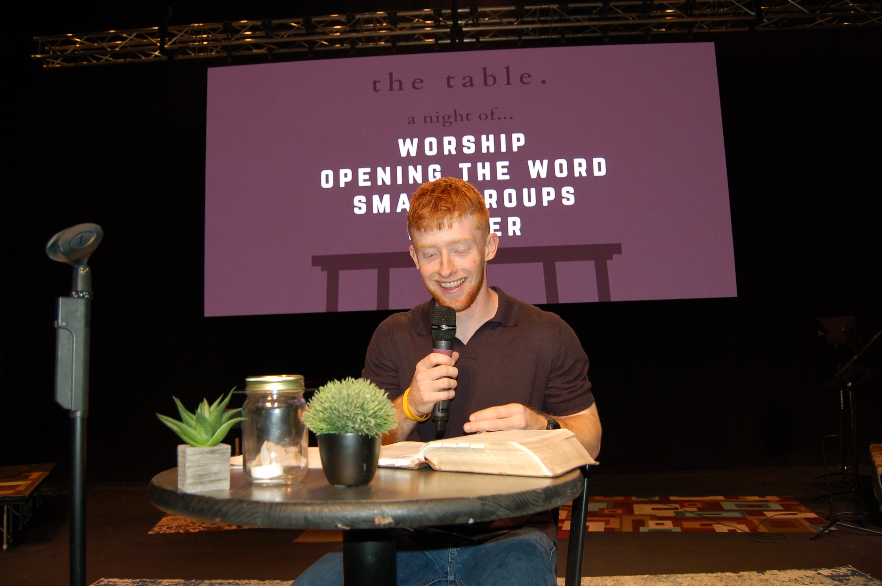 Konner Ireland leading a devotional at The Table