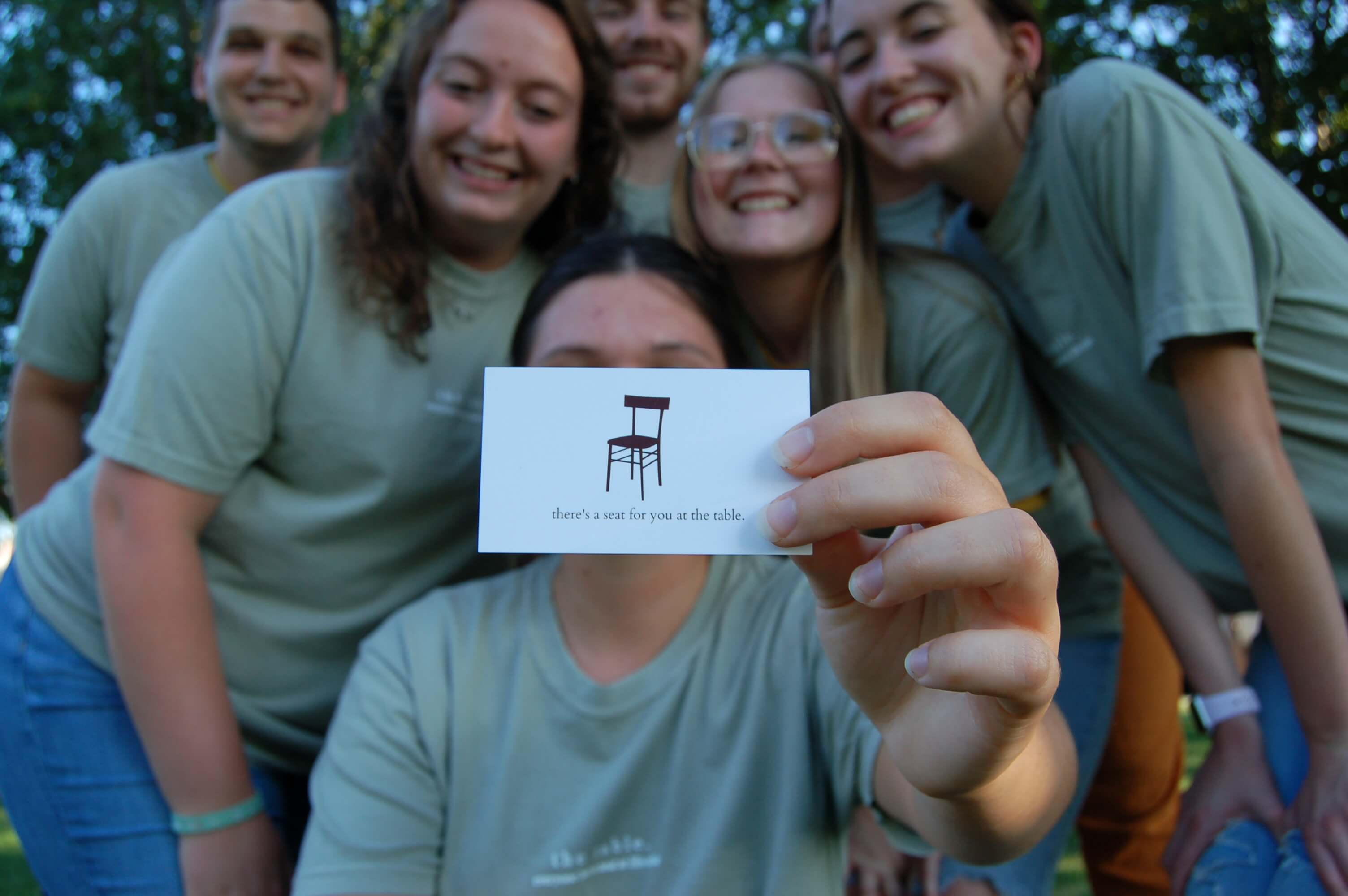 The Table business card and group picture
